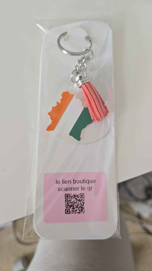 Porte-clé Côte d'Ivoire : Un Souvenir Unique de la Culture Ivoirienne